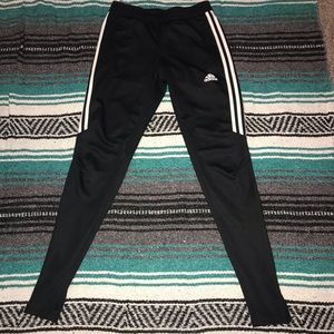 Black with white striped Adidas pants